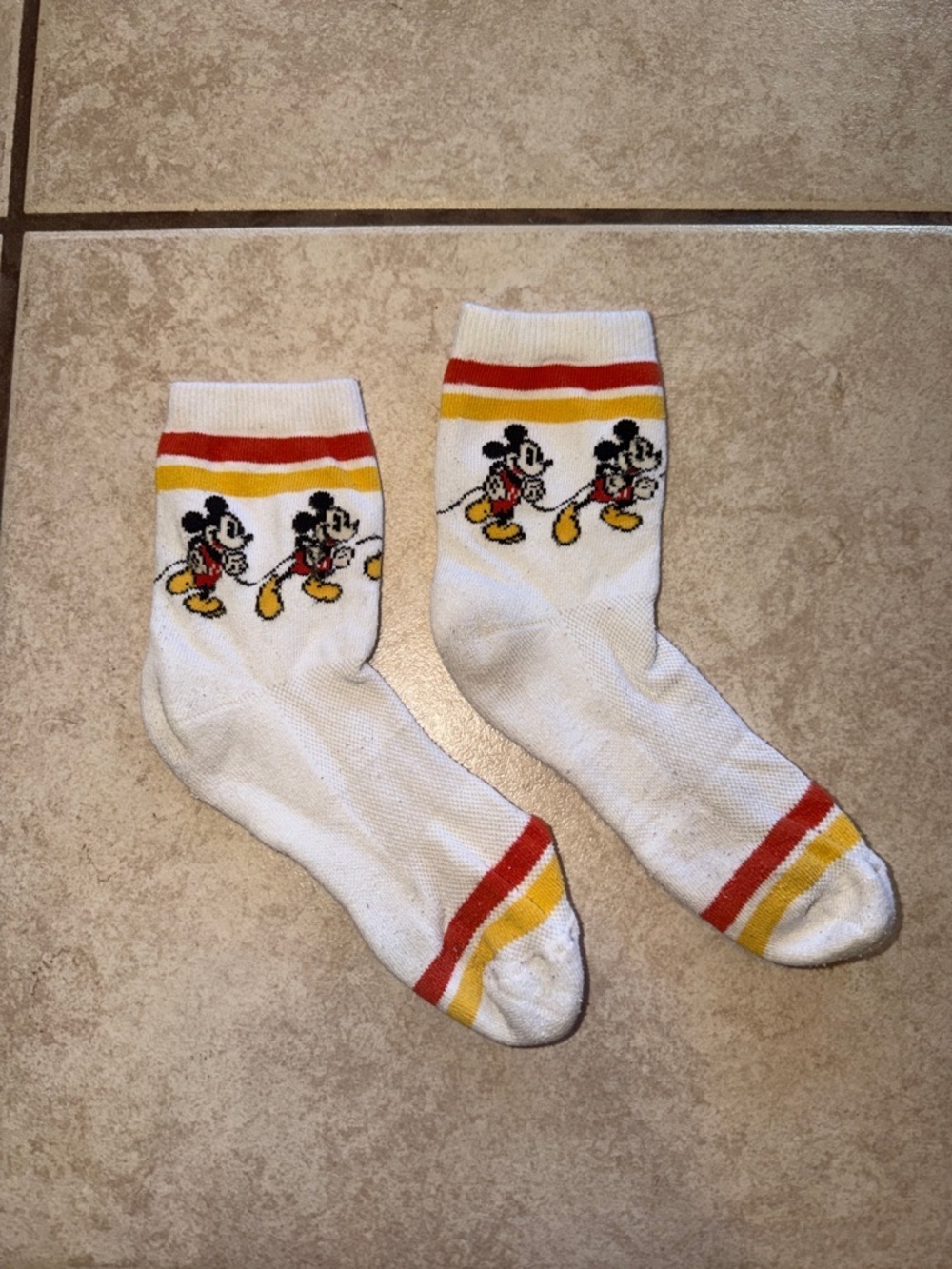 White Novelty Crew Socks with Red & Yellow Stripes worn